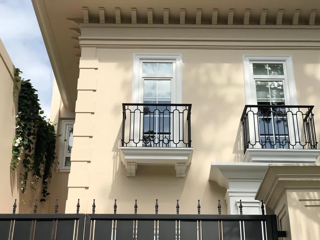 Balcony of Pakubuwono Residence with white UPVC windows