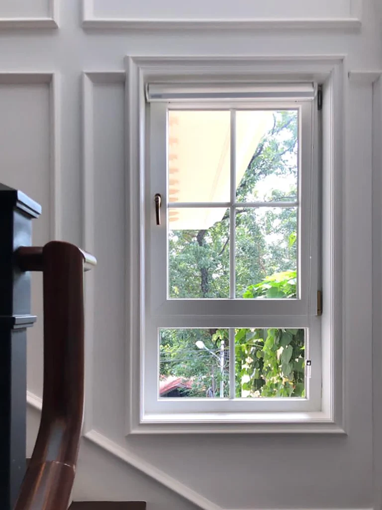 Interior view of Pakubuwono Residence with white UPVC windows