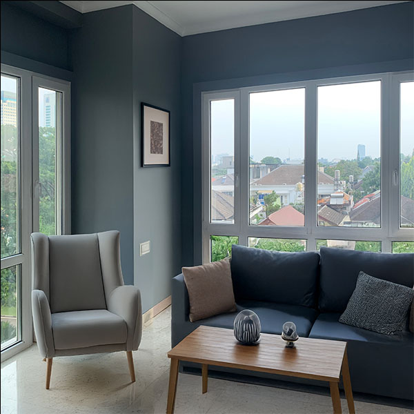 Pool view of Bali villa with grey UPVC windows