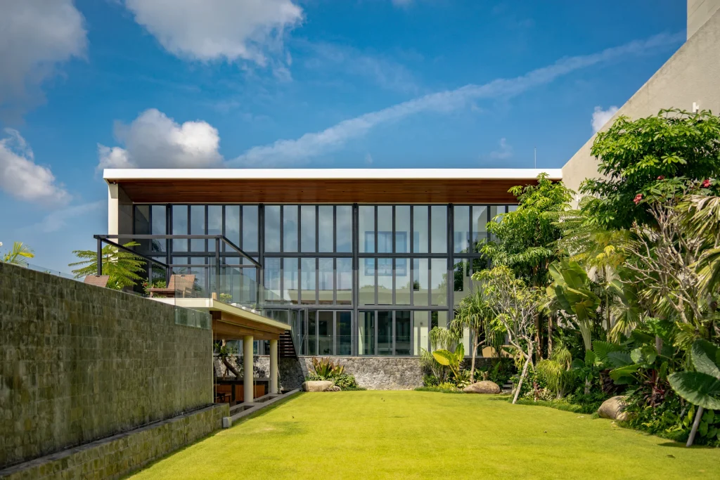 Night view of Guesthouse with pool in Bali, with Double Glazed Windows